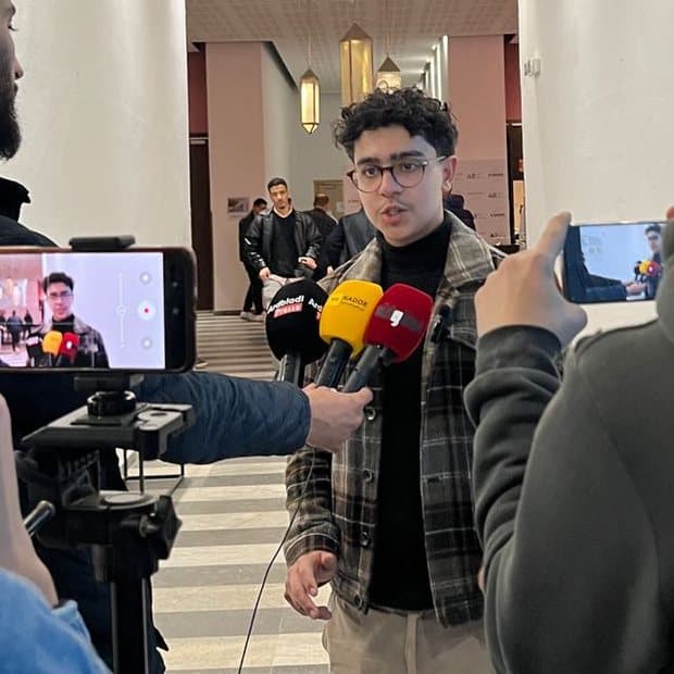 Fares Yachou speaking to press at an industry event in Dubai